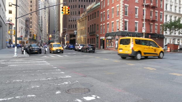 New York City, United States - 4 Sept 2023: Manhattan Downtown Financial District Water, Pearl and Broad street crossroad intersection. USA city life. Road car traffic. Yellow taxi. People pedestrian.