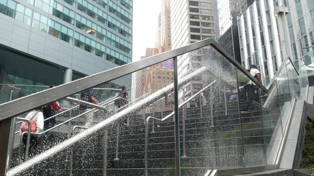 New York City, United States - 11 Sept 2023: Manhattan Midtown office buildings, Lexington avenue, United States. People pedestrian exiting subway metro station, stairs on 53 street, USA urban life.