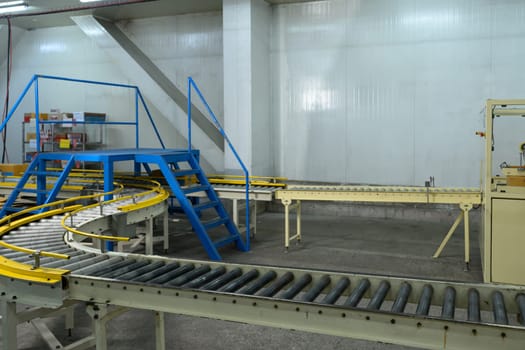 Empty conveyor belts in a food production facility.