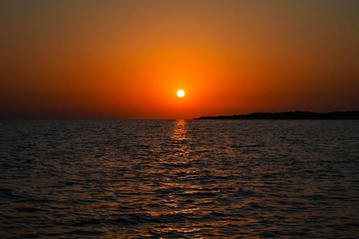 Beautiful sunset on the sea. Concept for travel, summer and vacation.