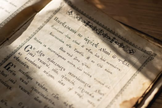 Belarus, Minsk - 09.03.2025: The pages of a book are opened wide, revealing a section filled with intricate Russian handwriting across the paper surface