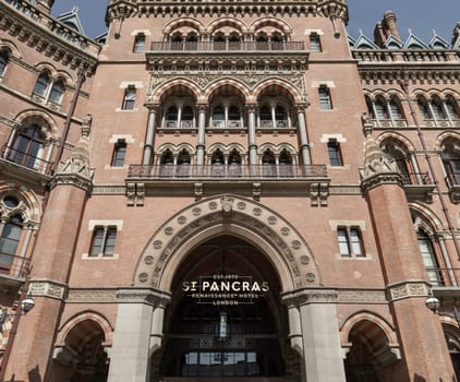 London, UK - Apr 11, 2025 - Facade of the gothic building where the St. Pancras Renaissance Hotel is based in Kings Cross. Stunning outside entrance of Victorian architecture at the Midland Grand Hotel, use it as your Wallpaper, Poster and Space for text, Selective focus.
