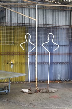 Clothes hangers, clothes racks on an abandoned market stall in Swinoujscie in Poland at the end of the season in winter