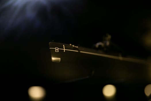 Submarine sailing in the dark water of the ocean