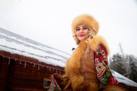 A Russian girl in traditional dress poses gracefully with a horse during a Maslenitsa celebration in a snowy landscape.
