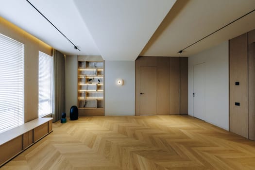 An empty room featuring a beautiful wooden floor, complemented by crisp white walls that enhance its spacious feel