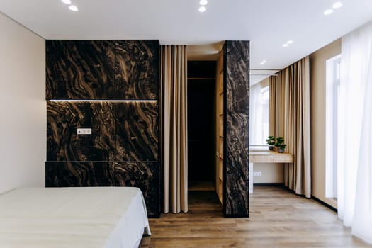 The bedroom features a cozy bed and a spacious walkin closet, perfect for organizing all your clothing and accessories with ease