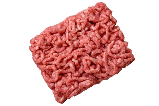 Stuffing or ground raw beef or pork with salt and spices on a black background