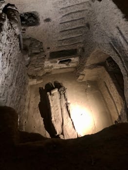 The Catacombs of San Gennaro are underground paleo-Christian burial and worship sites in Naples, Italy, carved out of tuff, a porous stone.