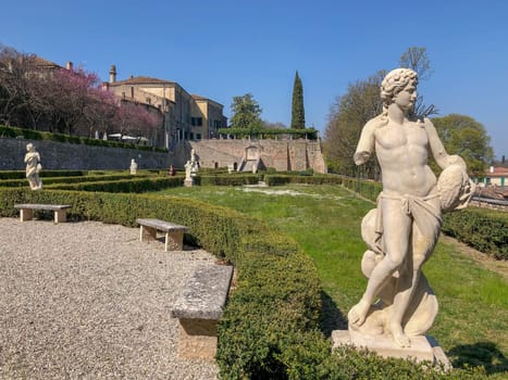 Italian Garden and statue in Volta Mantovana and. High quality photo