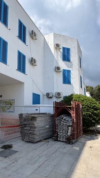 Budva, Montenegro - April 17, 2025: Urban construction site showcasing building materials and air conditioning, highlighting resistance to external influences