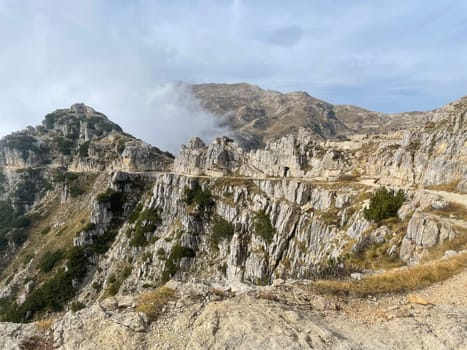 The 52 Gallery Road is a WWI military mule track on the Pasubio massif in northeastern Italy. It's a walkable trail in summer, hiking is prohibited. The trail is interesting for its landscapes, history, and engineering. The elevation is about 750 meters, starting point is Bocchetta Campiglia and it takes 2.5 - 3 hours to reach the shelter. It's necessary to bring a flashlight for the darker parts of the galleries. Not recommended during storms or bad weather.