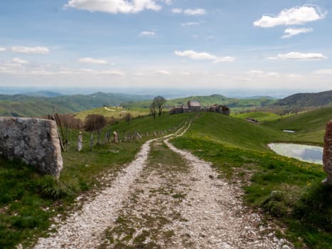 Italian hut in mountain landscape - Mountain Lessini Verona Northern Italy High quality photo