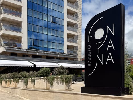 Budva, Montenegro - April 18, 2025: The exterior of the modern Fontana restaurant highlights its urban cuisine and attractive atmosphere