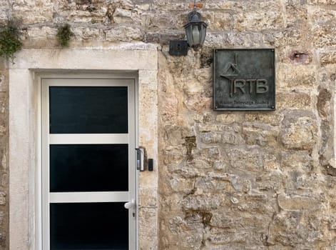 Budva, Montenegro - April 18, 2025: Entrance to the building of Radio Television Budva in the concept of media communications in Montenegro