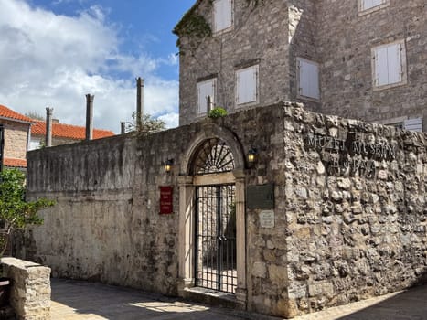 Budva, Montenegro - April 18, 2025: Historic stone building with museum in Montenegro showcasing the concept of cultural heritage