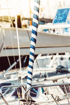 Sailboat details with blurred marina background