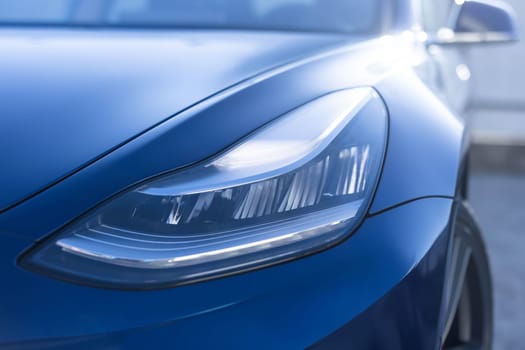 Modern car headlamp flashing light with blinking on continuously indicator. Car Front Full Led Light. Switched on led lights of luxury car. Car Blinker Light.
