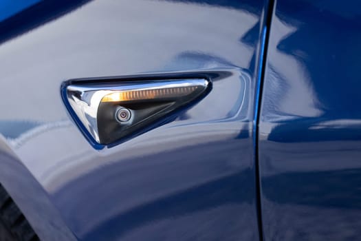 Lviv, Ukraine - April 17, 2025: Autonomous self-driving Tesla Model 3 performance autopilot. Ultrasonic sensors, cameras and radar. Technology of artificial intelligence helps a car to park itself.