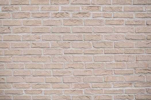 Beige brick wall background grunge texture