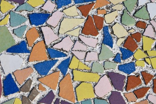 Art ceramic mosaic on the floor, mosaic background. colorful mosaic. texture mosaic.