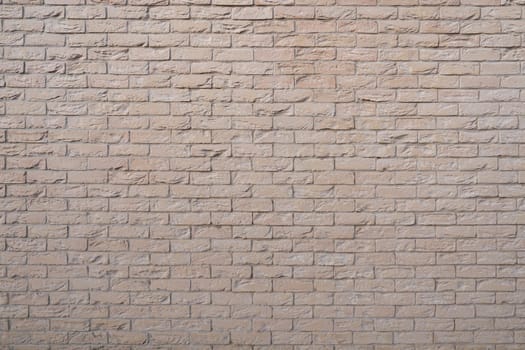 Beige brick wall background grunge texture