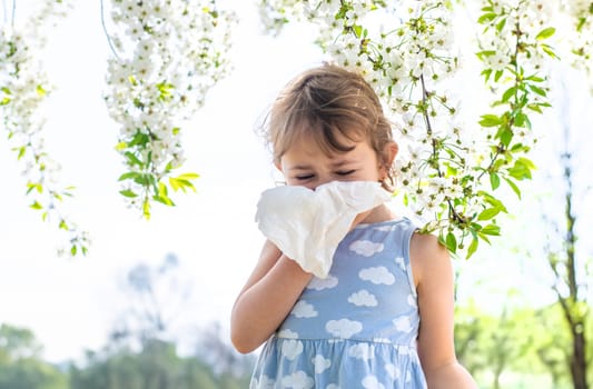 child allergic to flowering trees. Selective focus. kid.