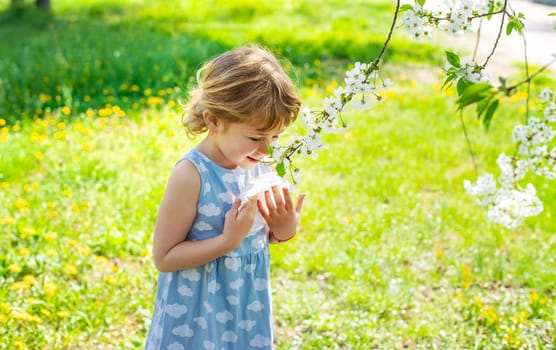 child allergic to flowering trees. Selective focus. kid.