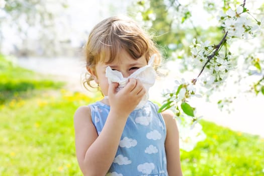 child allergic to flowering trees. Selective focus. kid.