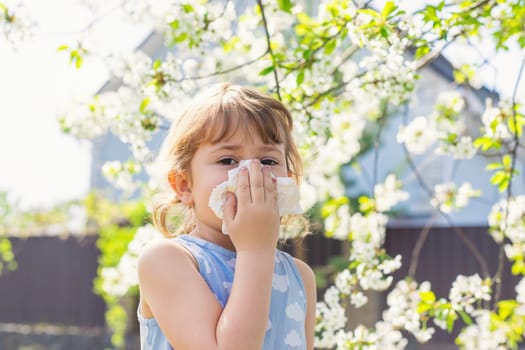 child allergic to flowering trees. Selective focus. kid.