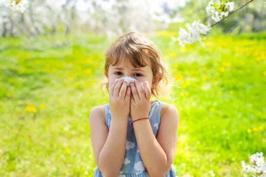 child allergic to flowering trees. Selective focus. kid.