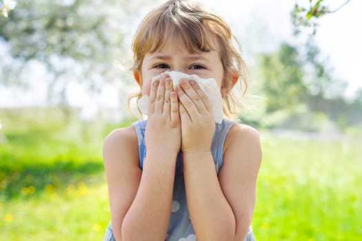 child allergic to flowering trees. Selective focus. kid.