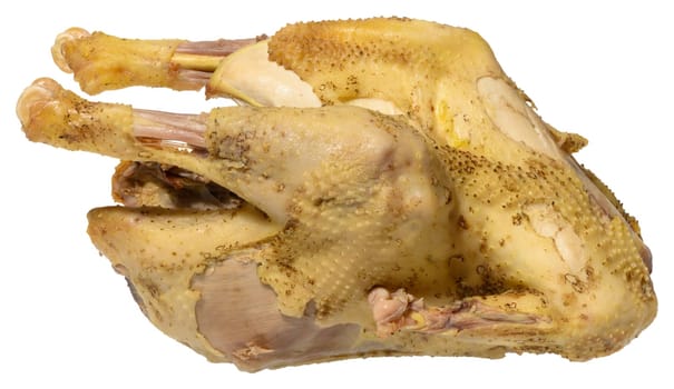 A whole boiled chicken, pale yellow in color,  isolated background, ready to be served