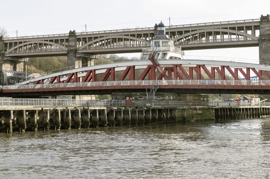 Newcastle, UK - Apr 11, 2025 - Beautiful view of Swing bridge and The High level bridge spanning the River Tyne connecting Newcastle upon tyne and Gateshead in North East England. use it as your Wallpaper, Poster and Space for text, Selective focus.
