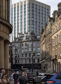 Newcastle, UK - Apr 11, 2025 - View of Akenside House with Cale Cross House in the background at Akenside Hill in the Quayside at Newcastle upon Tyne. High rise office block towering above older buildings, use it as your Wallpaper, Poster and Space for text, Selective focus.