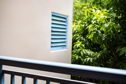 Blue Wooden Ventilation Vents On Building Walls, Background for advertising and wallpaper in structure and buildings scene