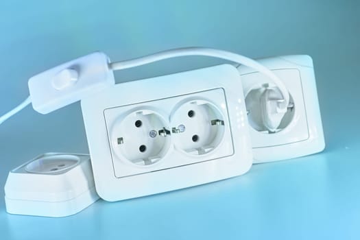 able to be connected by means of a plug. an electrical device receiving a plug or light bulb to make a connection