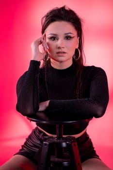 A striking and stunning portrait showcasing a model with a confident and bold pose, rich vibrant colors
