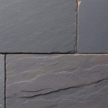 Close up of black stone pavement texture - background