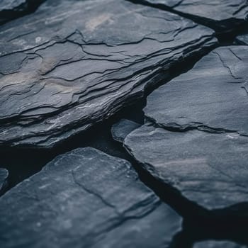 Black stone wall texture background - close up of black stone wall