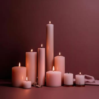 Burning candles on a dark background