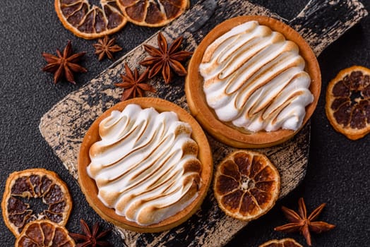 Lemon tart, meringue pie or fruit cream tart. Dessert, sweets for the morning table