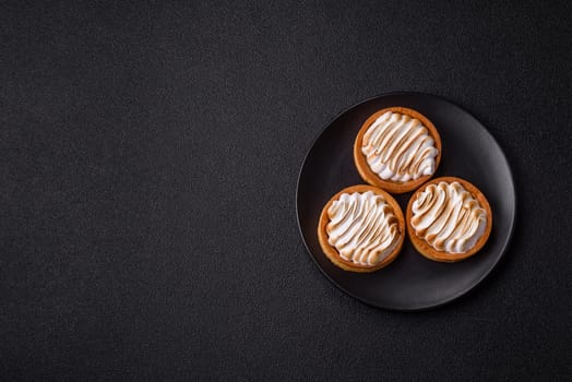 Lemon tart, meringue pie or fruit cream tart. Dessert, sweets for the morning table