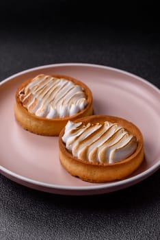 Lemon tart, meringue pie or fruit cream tart. Dessert, sweets for the morning table