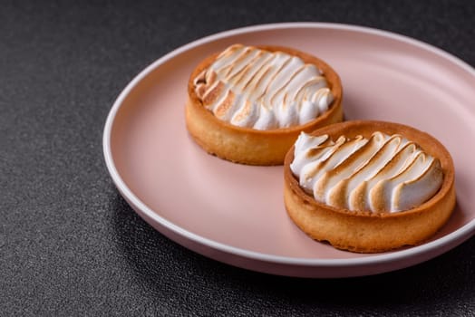 Lemon tart, meringue pie or fruit cream tart. Dessert, sweets for the morning table