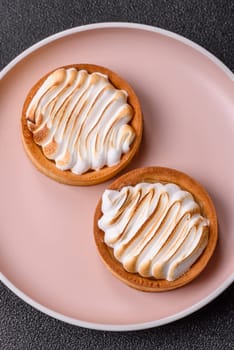 Lemon tart, meringue pie or fruit cream tart. Dessert, sweets for the morning table