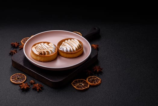 Lemon tart, meringue pie or fruit cream tart. Dessert, sweets for the morning table