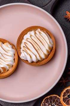 Lemon tart, meringue pie or fruit cream tart. Dessert, sweets for the morning table