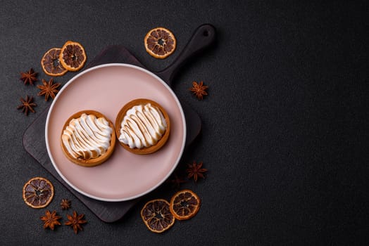 Lemon tart, meringue pie or fruit cream tart. Dessert, sweets for the morning table