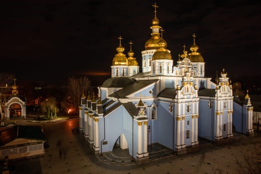 The Orthodox Church of Ukraine St. Michael's Golden-Domed Monastery in the Ukrainian Baroque style at night light - Kyiv, Ukraine. Horizontal.